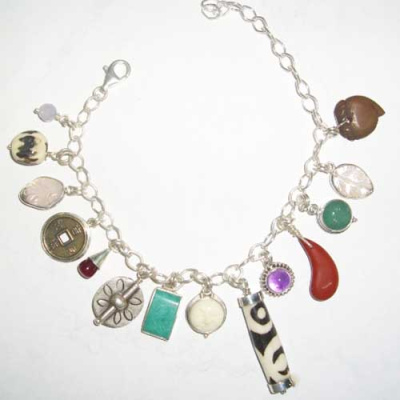 Sterling Silver Chinese Coin, Mudbead and Turquoise Charm Bracelet with Multiple Charms